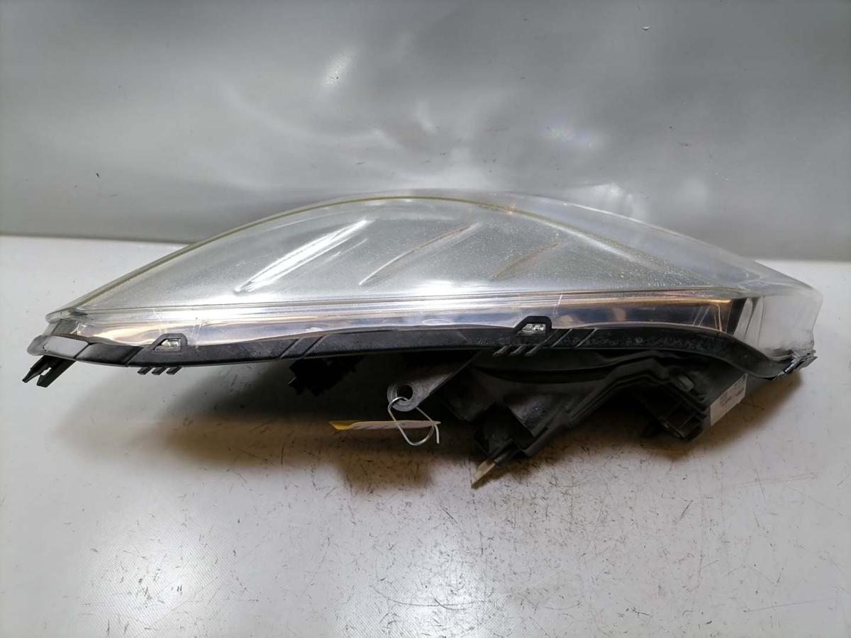 Dacia Sandero original Scheinwerfer links Halogen obehalb leicht vergilbt Bj.2009